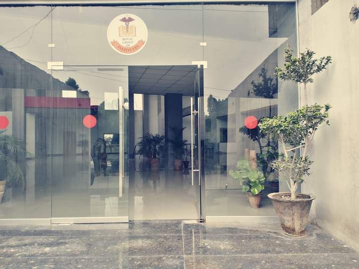 Glass entrance of Royal Institute of Health Sciences, Atta Bakhsh Road, Kamahan, Lahore